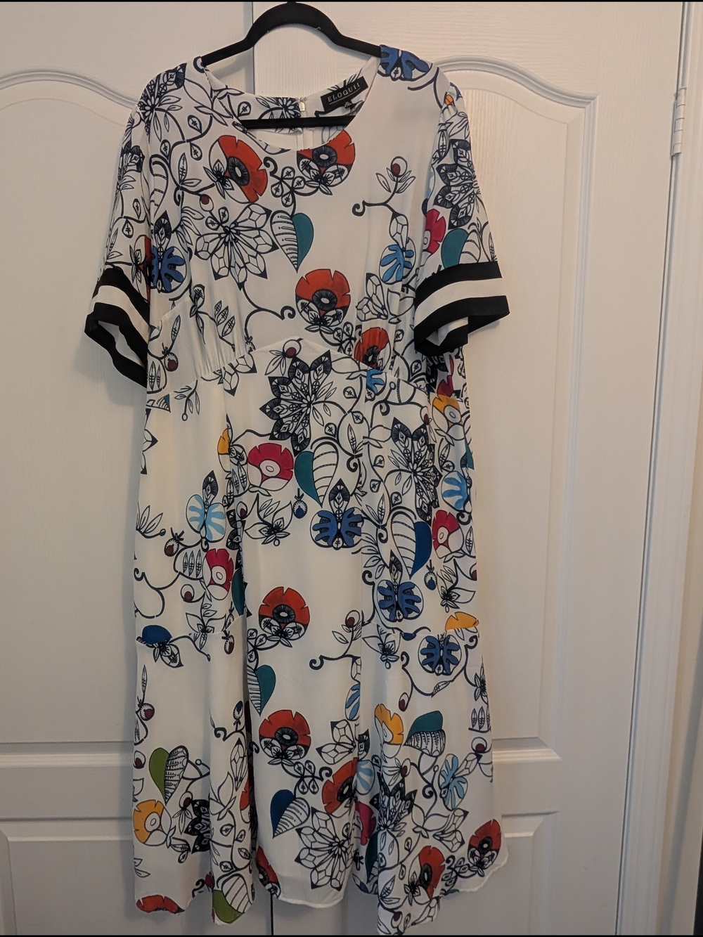 Eloquii White Dress with Navy Floral and Orange Accents